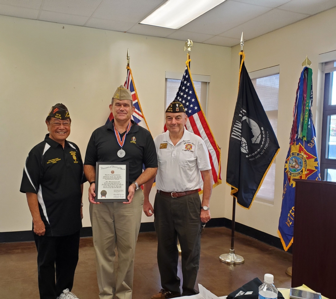 Post Commander Steve Mortimer, NCM Stan Fernandez, presented Art Tulak, COL (Ret) US Army with the
VFW Commendation Medal and certificate for his outstanding leadership as Chairman of the Hawai'i Governor's WWI
Commission Task Force.
